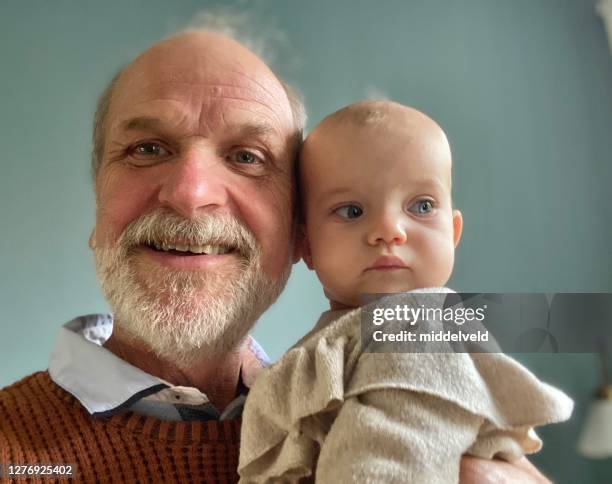 cute baby girl with here grandfather - baby grandpa imagens e fotografias de stock