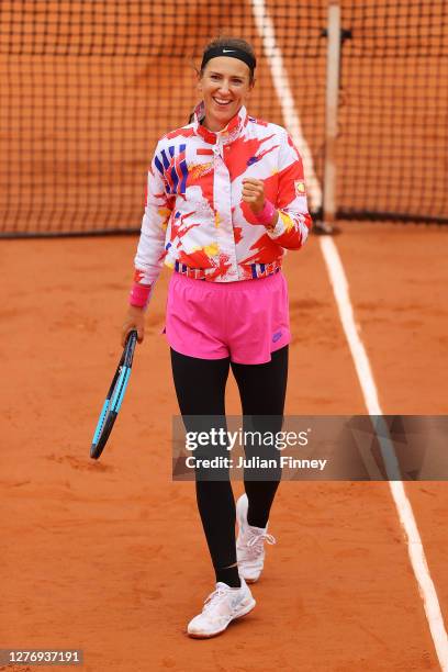 Victoria Azarenka of Belarus celebrates after winning match point following her Women's Singles first round match against Danka Kovinic of Montenegro...