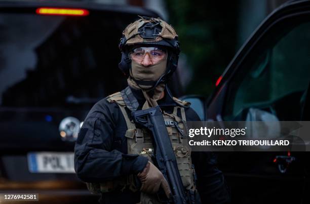 Police officer of unit RAID stands guard during protests in Lille, northern France, on June 29 two days after a teenager was shot dead during a...