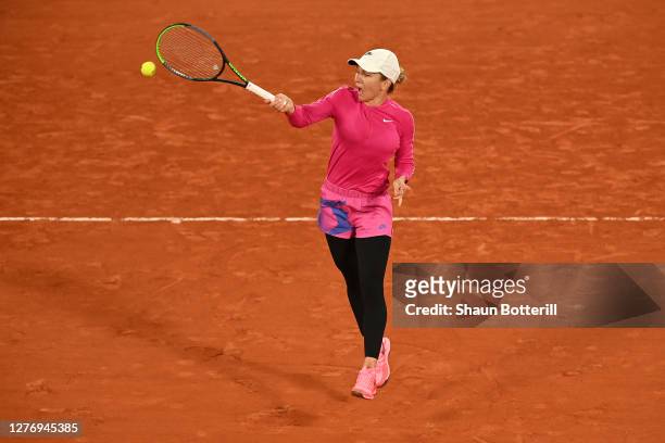 Simona Halep of Romania plays a forehand during her Women's Singles first round match against Sara Sorribes Tormo of Spain during day one of the 2020...