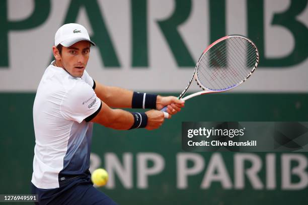 Elliot Benchetrit of France plays a backhand during his Men's Singles first round match against John Isner of the United States during day one of the...