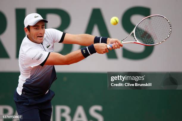Elliot Benchetrit of France plays a backhand during his Men's Singles first round match against John Isner of the United States during day one of the...