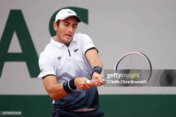 Elliot Benchetrit of France plays a backhand during his Men's Singles first round match against John Isner of the United States during day one of the...