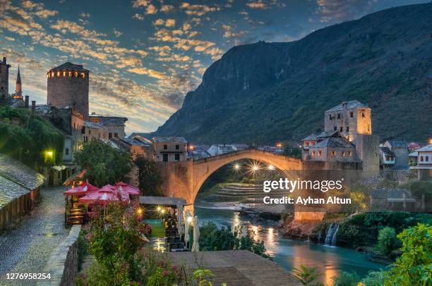 the mostar bridge (stari most) at night in mostar in bosnia and herzegovina - bosnia and herzegovina stock pictures, royalty-free photos & images