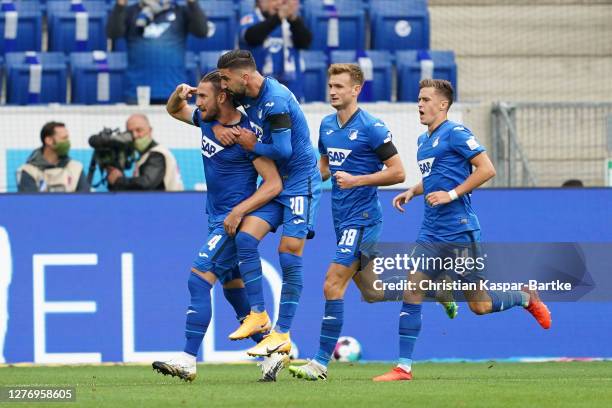 Ermin Bicakcic of TSG 1899 Hoffenheim celebrates after scoring his sides first goal during the Bundesliga match between TSG Hoffenheim and FC Bayern...