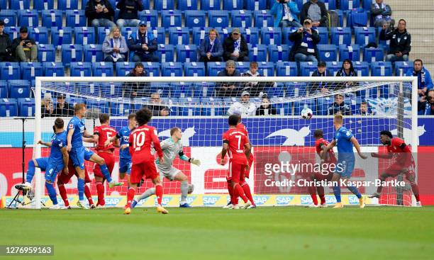 Ermin Bicakcic of TSG 1899 Hoffenheim scores his sides first goal during the Bundesliga match between TSG Hoffenheim and FC Bayern Muenchen at...
