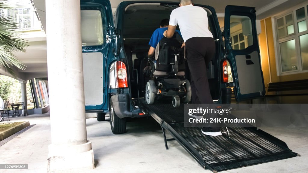 Everybody Using A Ramp Man On Wheelchair Using Vehicle Ramp High-Res Stock Photo - Getty Images