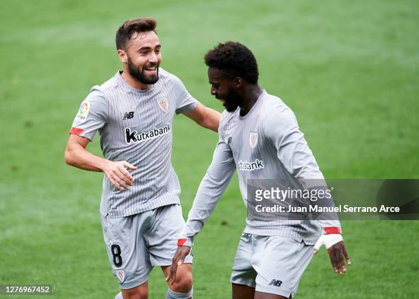 Unai Lopez of Athletic Bilbao celebrates with teammate Inaki Williams after scoring his sides first goal during the La Liga Santander match between...