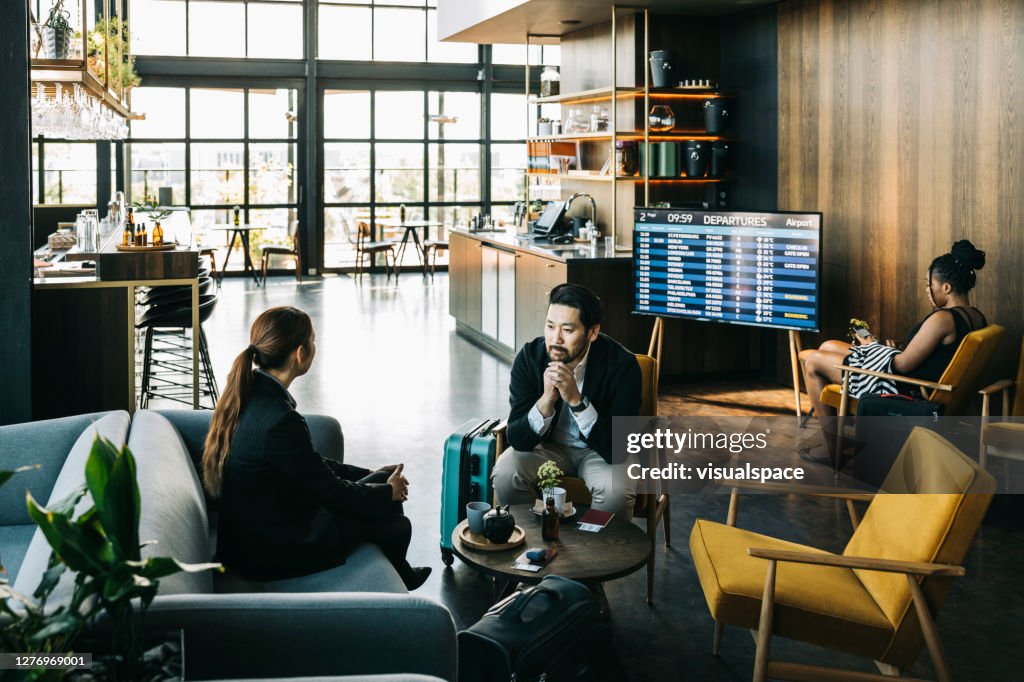 People at airport lounge