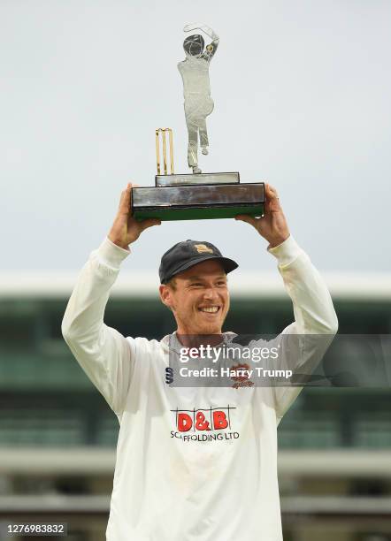 Tom Westley of Essex lifts the Bob Willis Trophy during Day Five of the Bob Willis Trophy Final match between Somerset and Essex at Lord's Cricket...