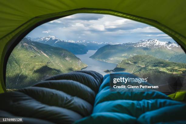 norwegian fjord viewed from tent. - camp tent stock pictures, royalty-free photos & images