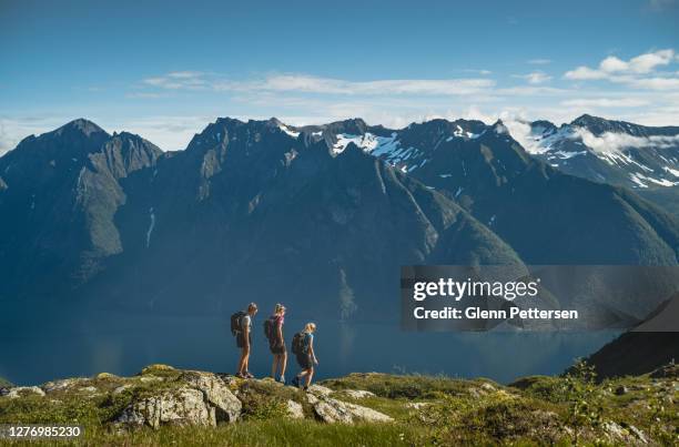 three girls hiking in norway - sunnmore alps stock pictures, royalty-free photos & images