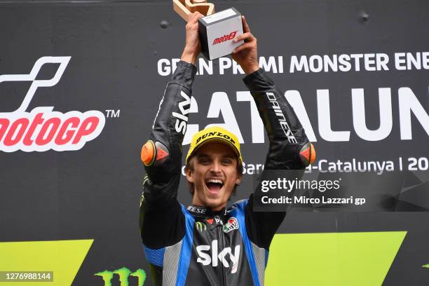 Luca Marini of Italy and Sky Racing Team VR46 celebrates the victory on the podium at the end of the Moto2 race during the MotoGP of Catalunya: Race...