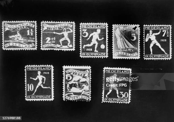 Commemorative stamps celebrating the 1928 Summer Olympics, depicting rowing, fencing, football, sailing and shot put, boxing, equestrian, and track...