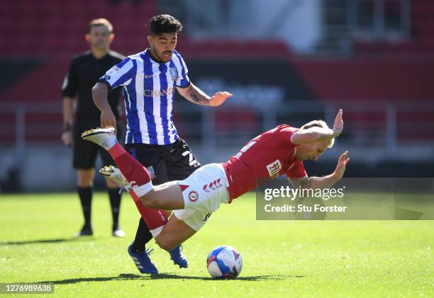 Bristol City player Andreas Weimann is fouled by Massimo Luongo of Sheff Wed during the Sky Bet Championship match between Bristol City and Sheffield...