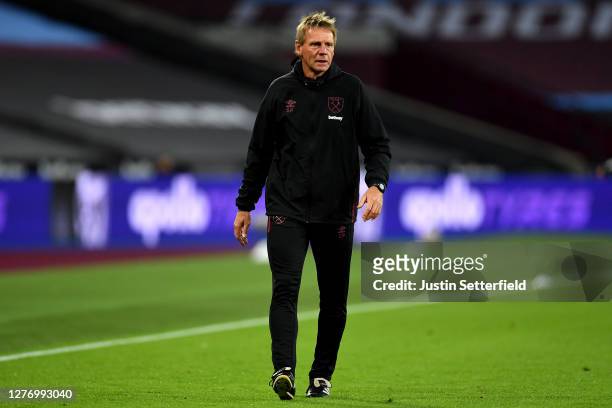 Stuart Pearce, first team coach of West Ham United looks on during the warm up prior to the Premier League match between West Ham United and...