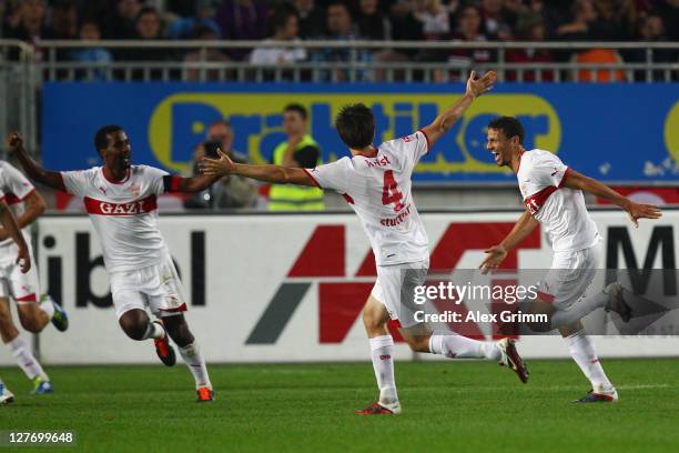 Khalid Boulahrouz of Stuttgart scores his team's second goal with team mates William Kvist and Cacau during the Bundesliga match between between 1....