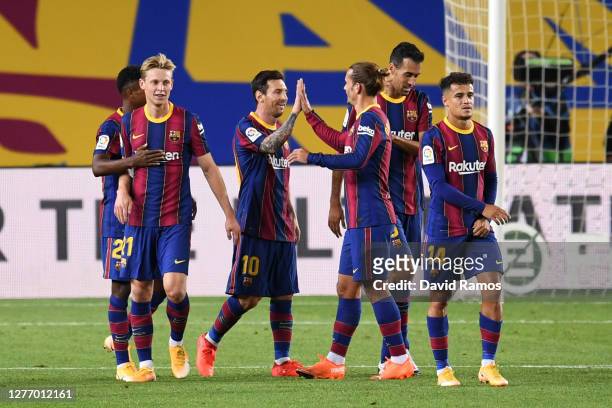 Lionel Messi, Antoine Griezmann and teammates of FC Barcelona celebrate their fourth goal during the La Liga Santander match between FC Barcelona and...