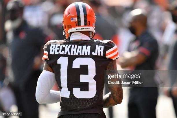 Wide receiver Odell Beckham Jr. #13 of the Cleveland Browns walks on the sidelines with the name of Breonna Taylor on his helmet during the second...