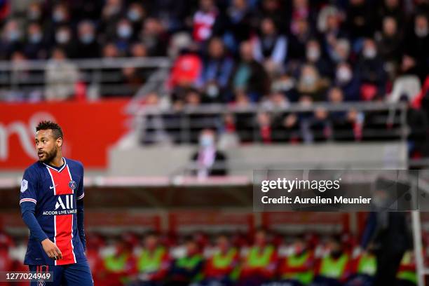 Neymar Jr of Paris Saint-Germain looks on during the Ligue 1 match between Stade Reims and Paris Saint-Germain at Stade Auguste Delaune on September...