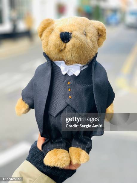 teddy bear wearing formal uniform - eton college stock pictures, royalty-free photos & images