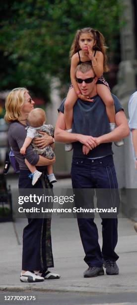 Madonna and Guy Ritchie, with their son, Rocco, and daughter with Carlos Leon, Lourdes, Leave a Riverside Park playground. Madonna was in town for a...