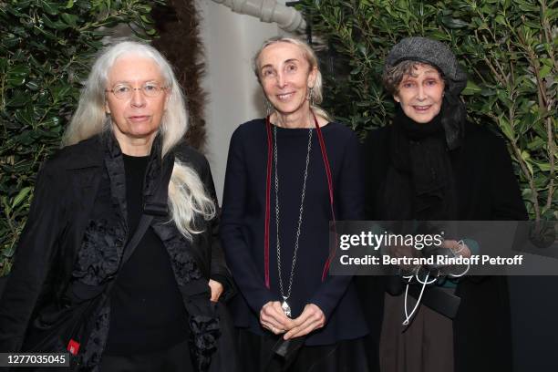 Carla Sozzani standing between photographers Dominique Issermann and Sarah Moon attend the "Azzedine Alaia Collector - Alaia and Balenciaga,...