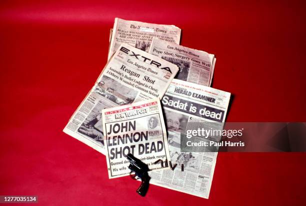 Headlines from New York Times, Los Angeles Times, Los Angeles Herald Examiner and the New York Post showing headlines of famous people being shot and...