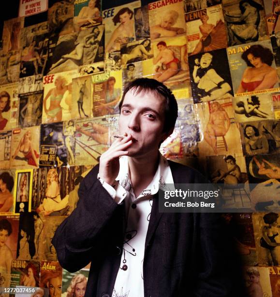 Bassist Colin Greenwood of the British alternative rock band Radiohead poses for a portrait while smoking his cigarette circa March, 1993 in New...