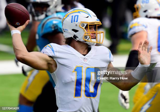 Justin Herbert of the Los Angeles Chargers throws during the second quarter in a 21-16 loss to the Carolina Panthers at SoFi Stadium on September 27,...
