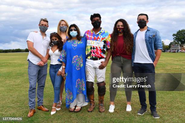 Guests are seen with a Team Alquimi player at Grandiosity Events 4th annual Polo & Jazz celebrity charity benefit hosted by Real Housewives of...