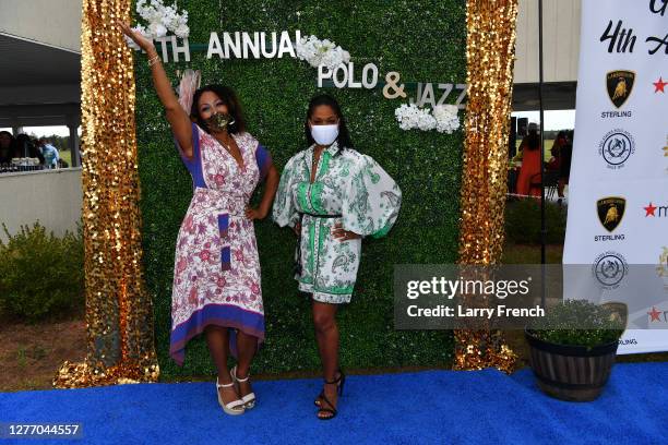 Susan Smallwood, producer of Grandiosity Events Cigars & Guitars Charity Polo & Jazz charity event is seen with Shawn Yancy, award winning...