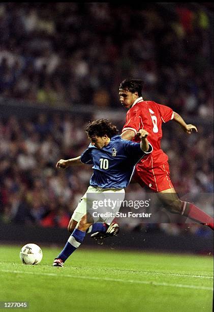 Alessandro Del Piero of Italy gets the better of Chris Coleman of Wales during the European Championship qualifier at Anfield in Liverpool, England....