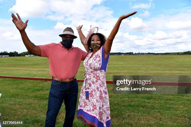 Ken Harvery, formerly of the Washington Football Team, and Susan Smallwood, producer of Grandiosity Events Cigars & Guitars Charity Polo & Jazz...