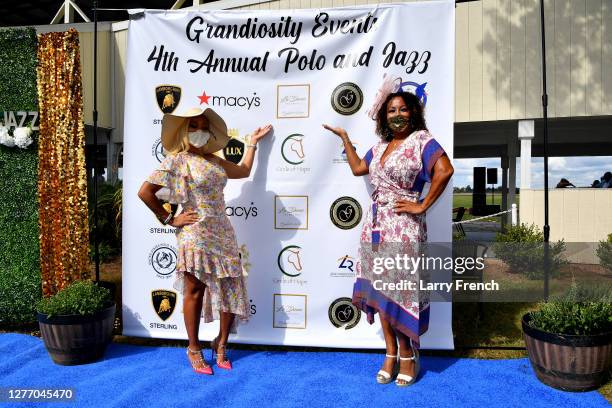 Karen Huger of Housewives of Potomac and Susan Smallwood, producer of Grandiosity Events Cigars & Guitars Charity Polo & Jazz charity event, appear...