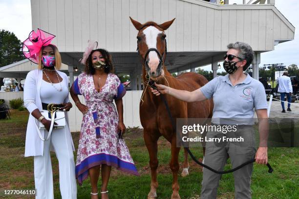 Vivian Agbakoba, Susan Smallwood, producer of Grandiosity Events Cigars & Guitars Charity Polo & Jazz charity event,, and Lesley Shear of Circle of...