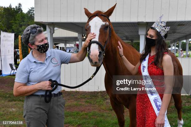 Lesley Shear of Circle of Hope Therapeutic Riding and Miss Teen Globe Martina Myers appear at Grandiosity Events 4th annual Polo & Jazz celebrity...