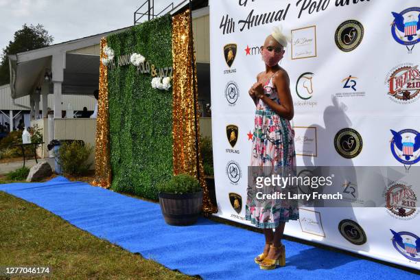 Tee Wright appears at Grandiosity Events 4th annual Polo & Jazz celebrity charity benefit hosted by Real Housewives of Potomac's Karen Huger, Susan...