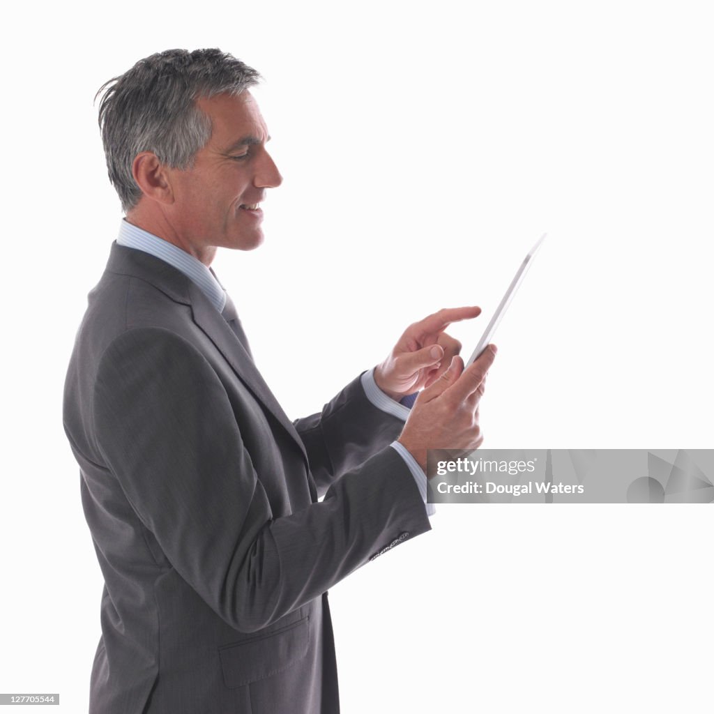 Business man using digital tablet.