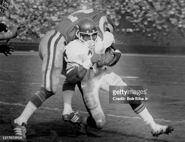 Chicago Bears rookie running back Walter Payton gets a short gain during game action against Los Angeles Rams, November 23, 1975 in Los Angeles,...