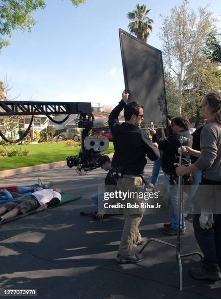 Film crews work on the set of My Name is Earl, with actors Jason Lee , Ethan Suplee and actress Alyssa Milano as they shoot a scene in which Earl &...