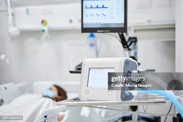 monitoring equipment in hospital ward - person on ventilator stock pictures, royalty-free photos & images