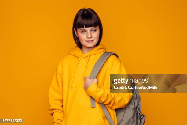 beautiful modern brunette girl - backpack isolated stock pictures, royalty-free photos & images