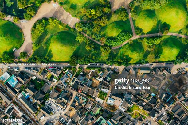 aerial view of gyeongju city with daereungwon ancient tombs - aerial park stockfoto's en -beelden
