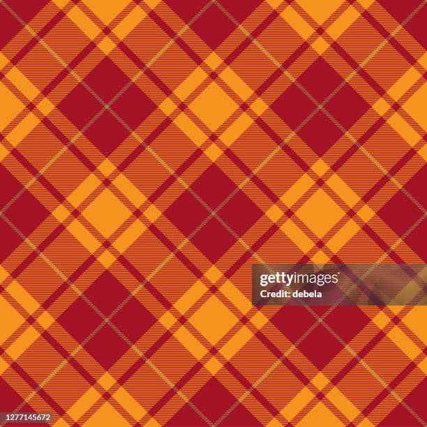 orange and red scottish tartan plaid textile pattern - argyle pattern background stock illustrations