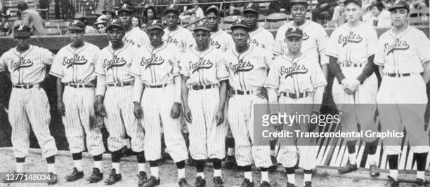 Portrait of members of the Newark Eagles baseball team as they pose at Ruppert Stadium, Newark, New Jersey, 1945.