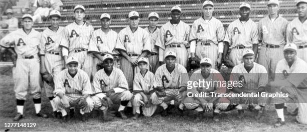 Portrait of members of the Almendares baseball team as they pose at Almendares Park, Havana, Cuba, 1939. Among those pictured are Adolfo Luque, Justo...