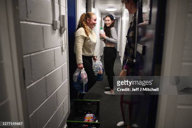 Students from Glasgow University receive food parcels at their accommodation at Murano Street student village on September 28, 2020 in Glasgow,...