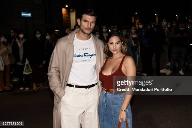 Italian model and influencer Marco Fantini and his partner Beatrice Valli guests arriving at the Salvatore Ferragamo fashion show during Milan...