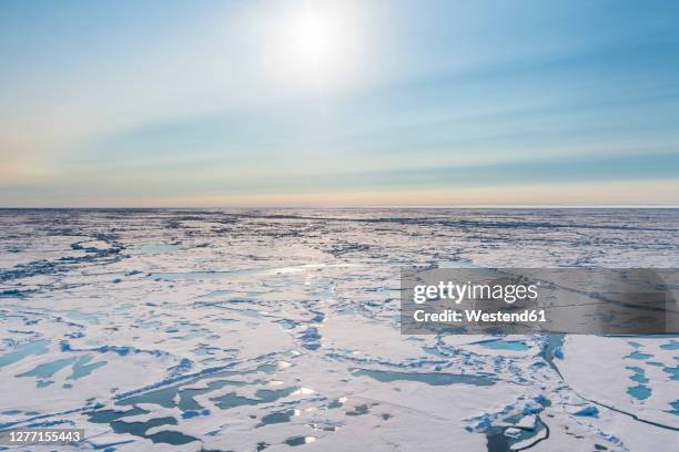 aerial view of melting ice on north pole - oceano-ártico imagens e fotografias de stock